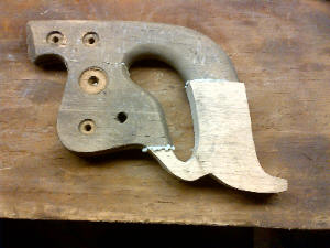 damaged crosscut saw handle